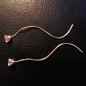 14k gold dangle earrings.